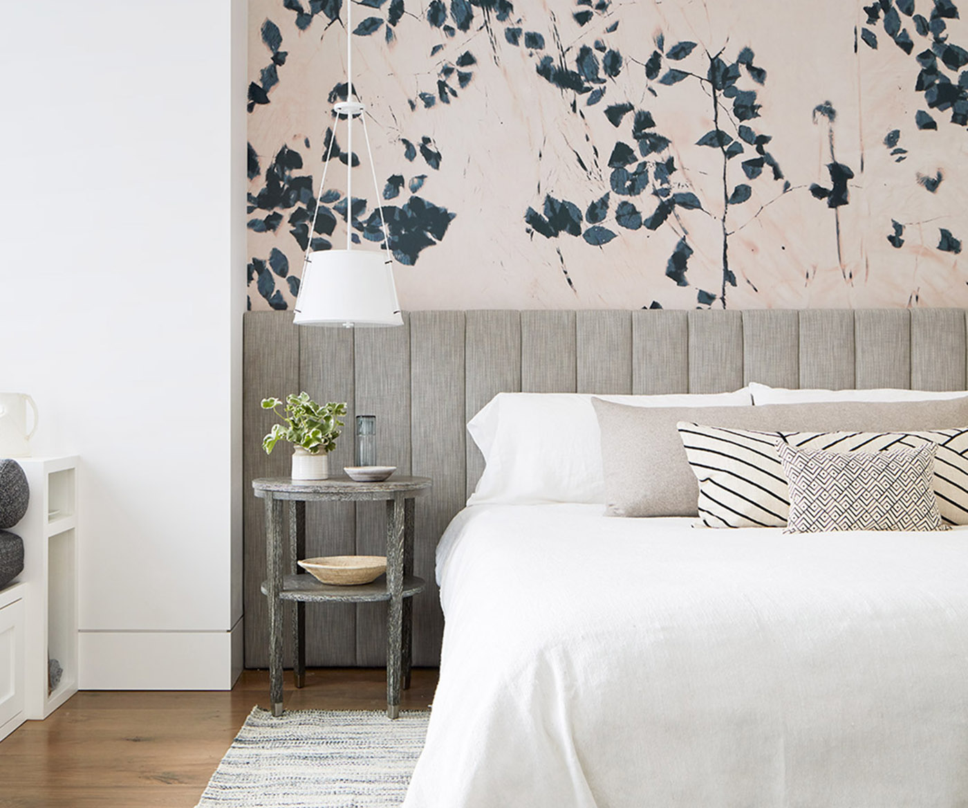 Calistoga upholstered headboard with botanical wall covering